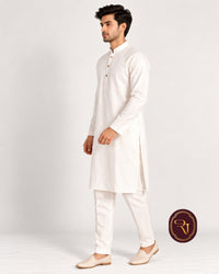 Men's pure cotton white kurta front view with brown buttons and side slits
